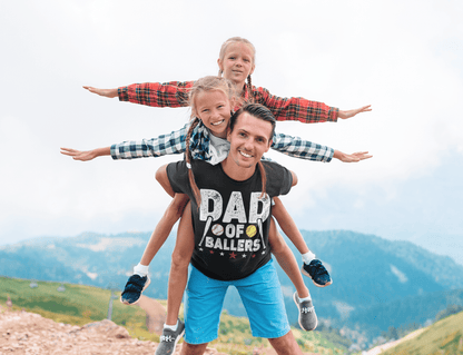 Dad Of Ballers 🥎⚾️ Unisex Softstyle T-Shirt - T-Shirt - Printify - CreationsByCaitlyn & More